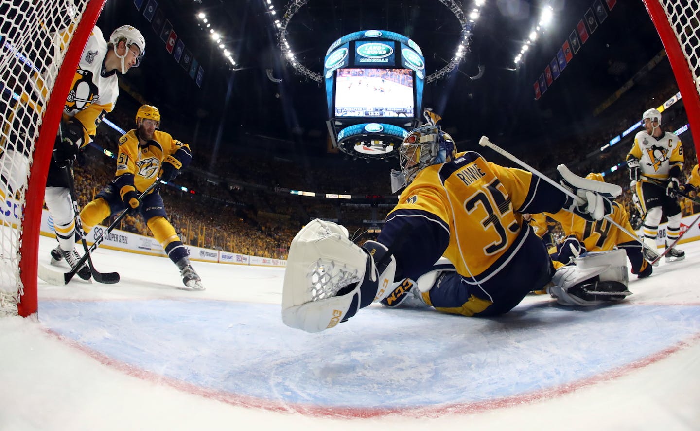 Nashville Predators goalie Pekka Rinne (35), of Finland, reaches to make a stop against the Pittsburgh PenguinsGame 3 of the NHL hockey Stanley Cup Final Saturday, June 3, 2017 in Nashville, Tenn. (Gregory Shamus/Pool Photo via AP)