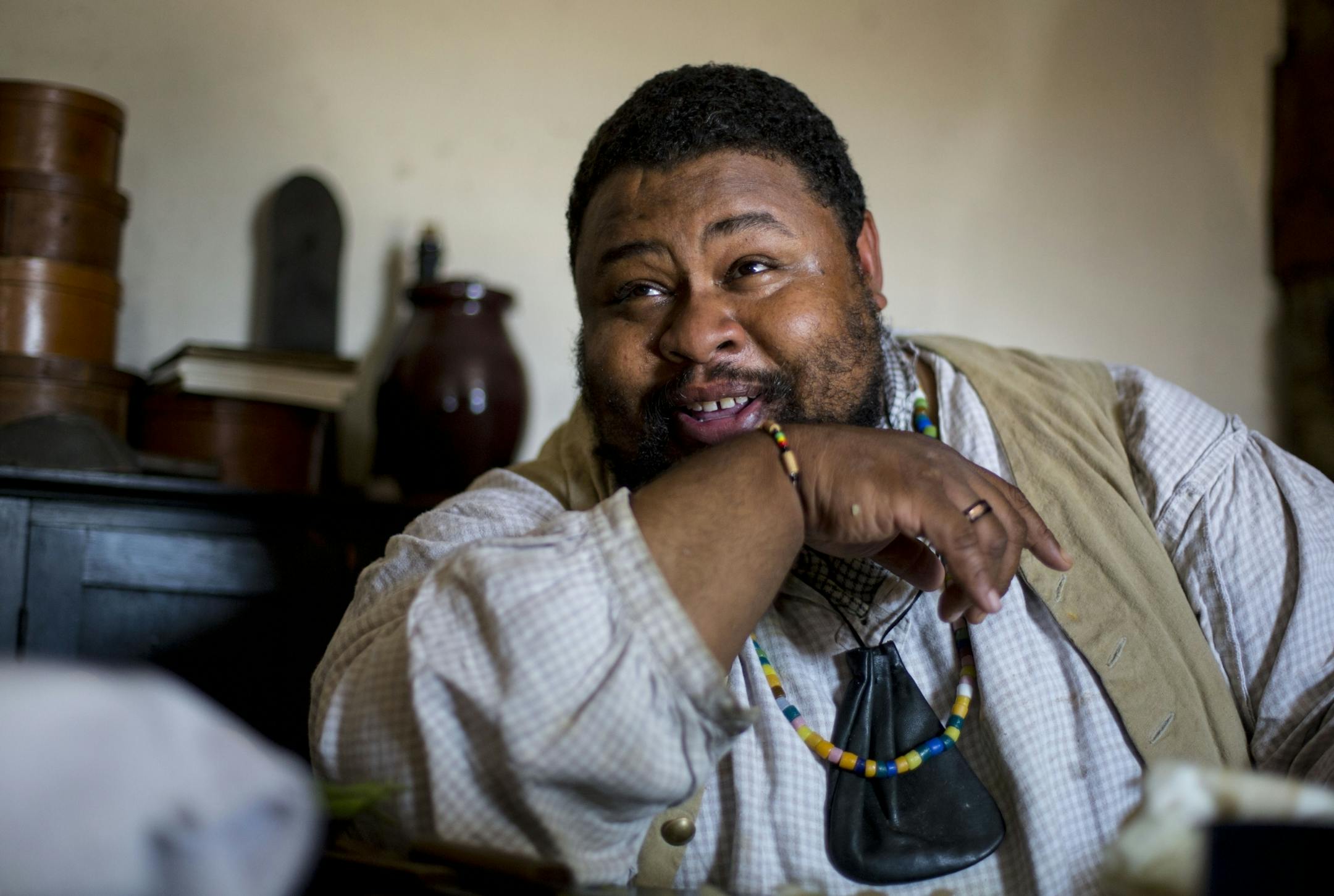 Michael Twitty laughs as he tells stories about his travels and experiences to the crowd.