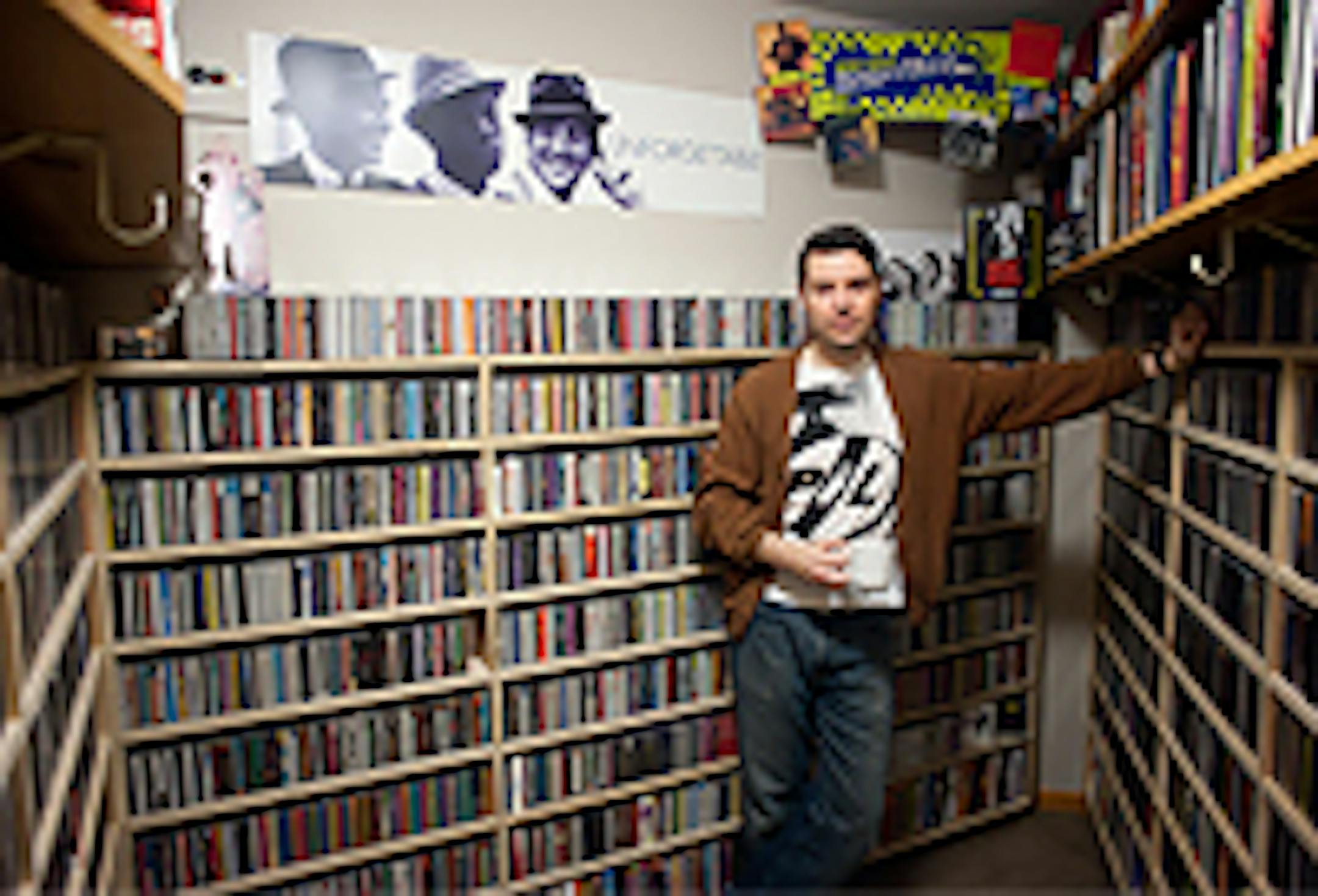 Rudh at home with his CD collection