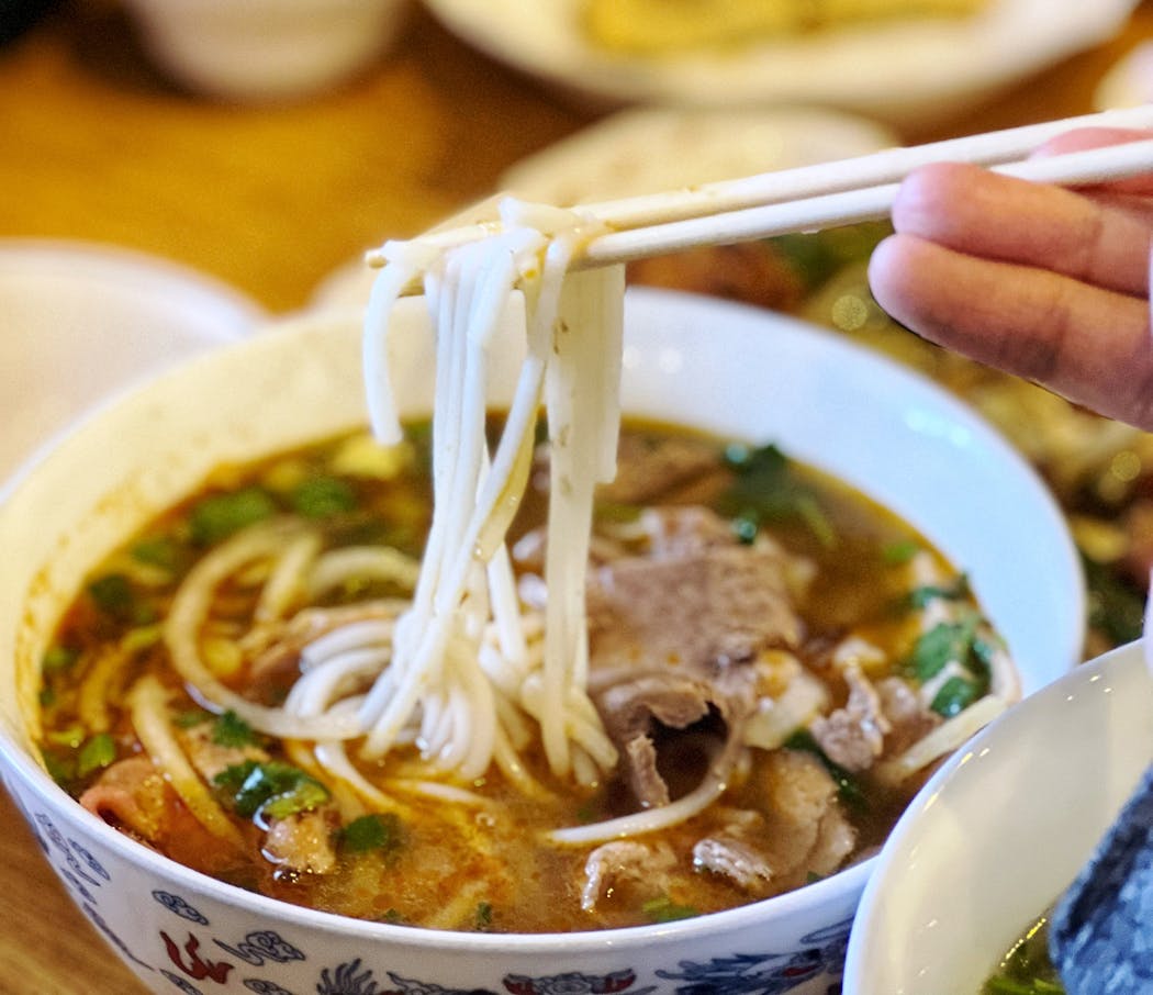 Critic Jon Cheng writes starred reviews as well as  features, like where to find the best pho in the Twin Cities area.
