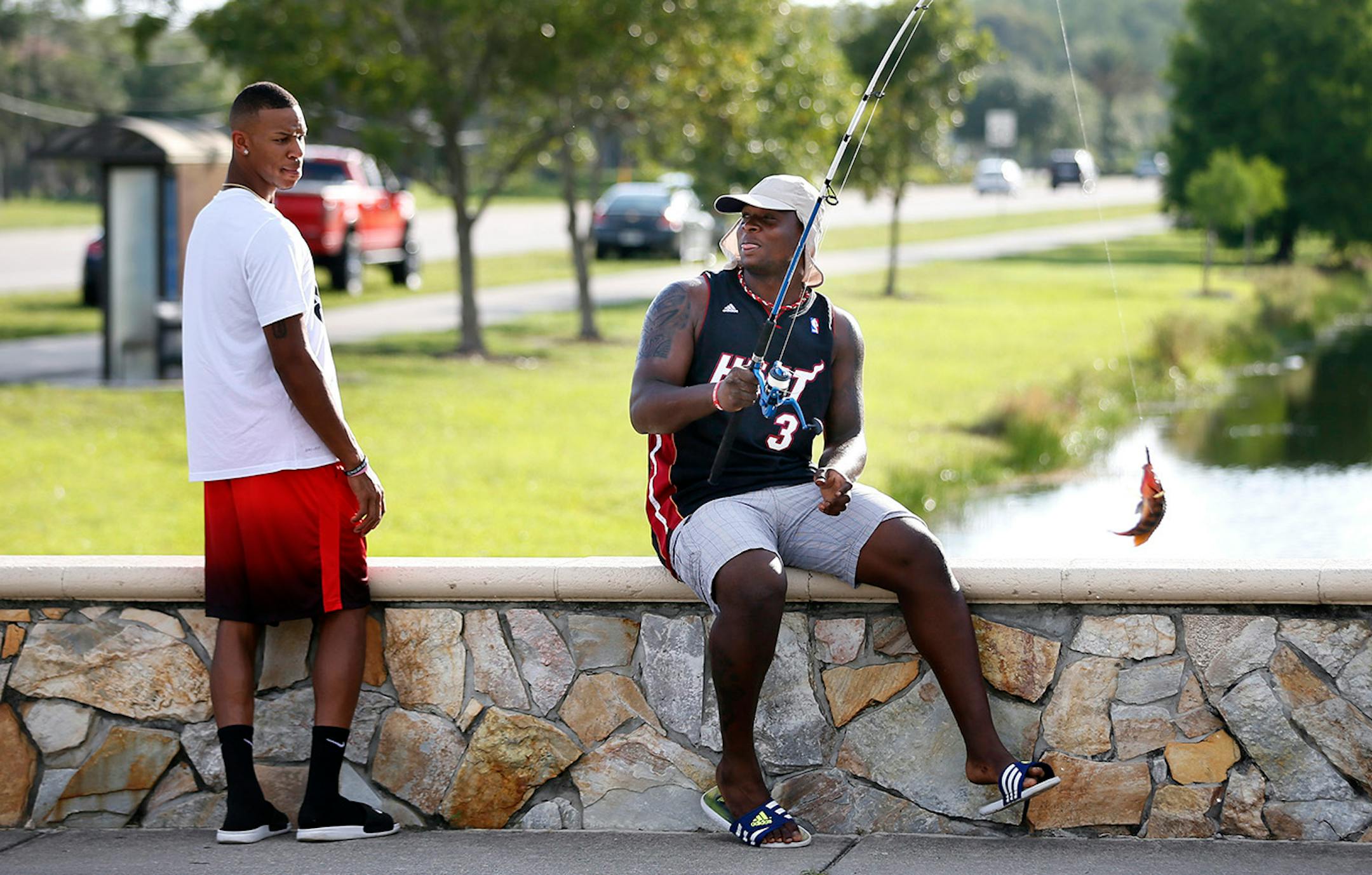 Byron Buxton left and Sano did some canal fisdhing in June 2014 while both were recovering from injuries.