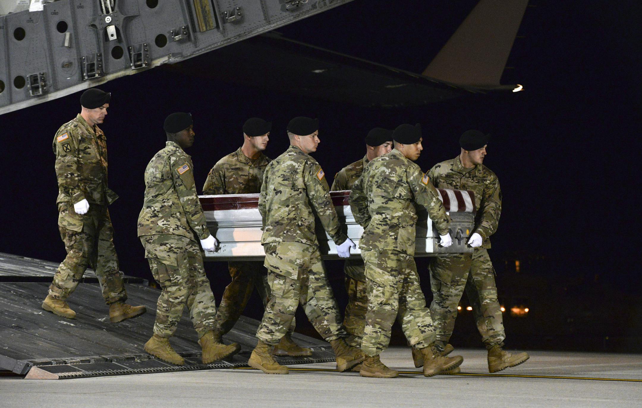 In a photo provided by the U.S. Air Force, the remains of Staff Sgt. Dustin Wright, one of four American soldiers killed in a firefight in Niger, is returned to Dover Air Force Base in Delaware, Oct. 5, 2017. Senior military officials said that a report will likely reveal that the American troops had deployed to a hostile area without adequately assessing the risk, and lacked ready access to medical support. (U.S. Air Force via The New York Times) -- FOR EDITORIAL USE ONLY --