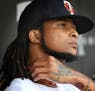 Twinsí right-handed pitcher Ervin Santana sat in the dugout moments before the start of the game.