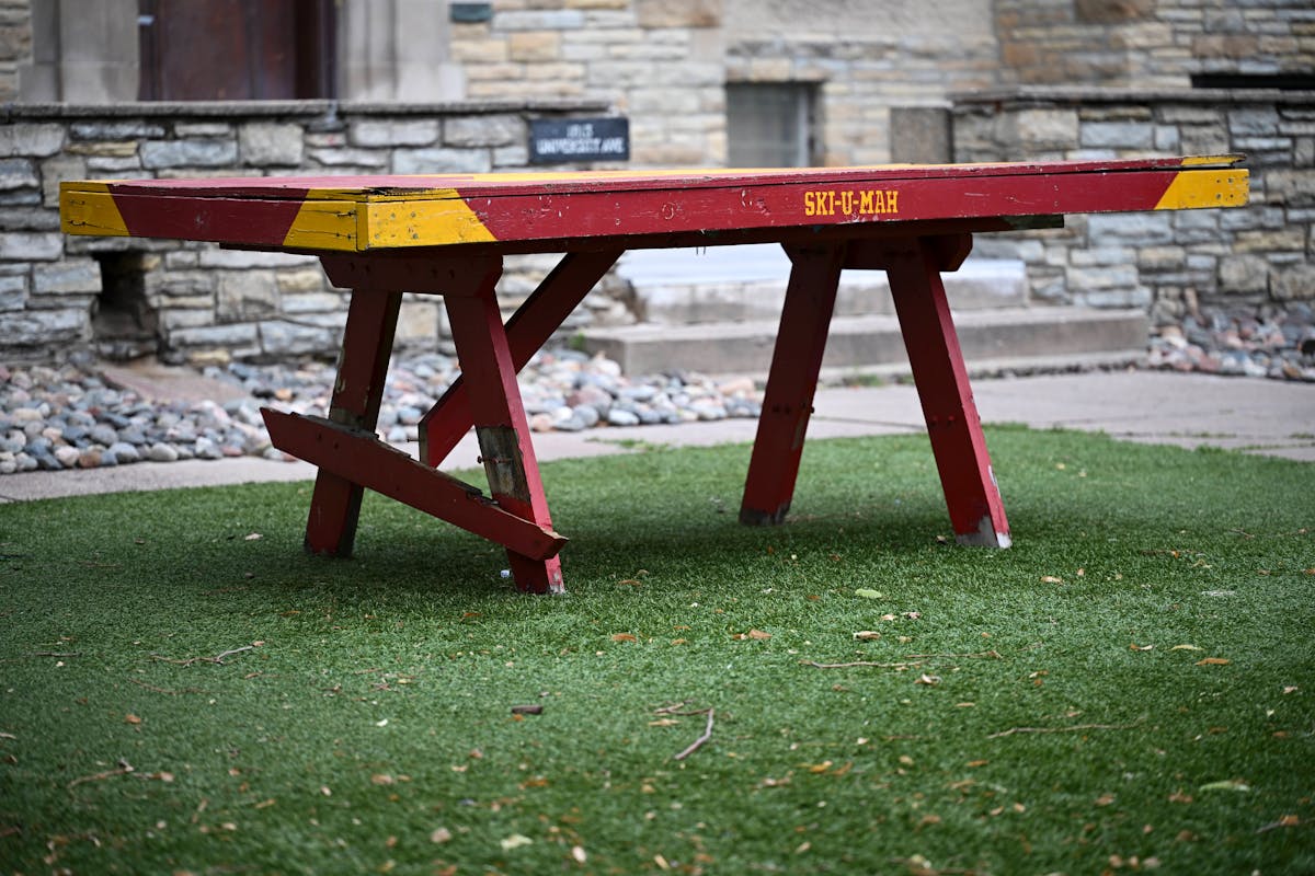 A table sits on the turf outside Pi Kappa Alpha on Thursday, June 20.