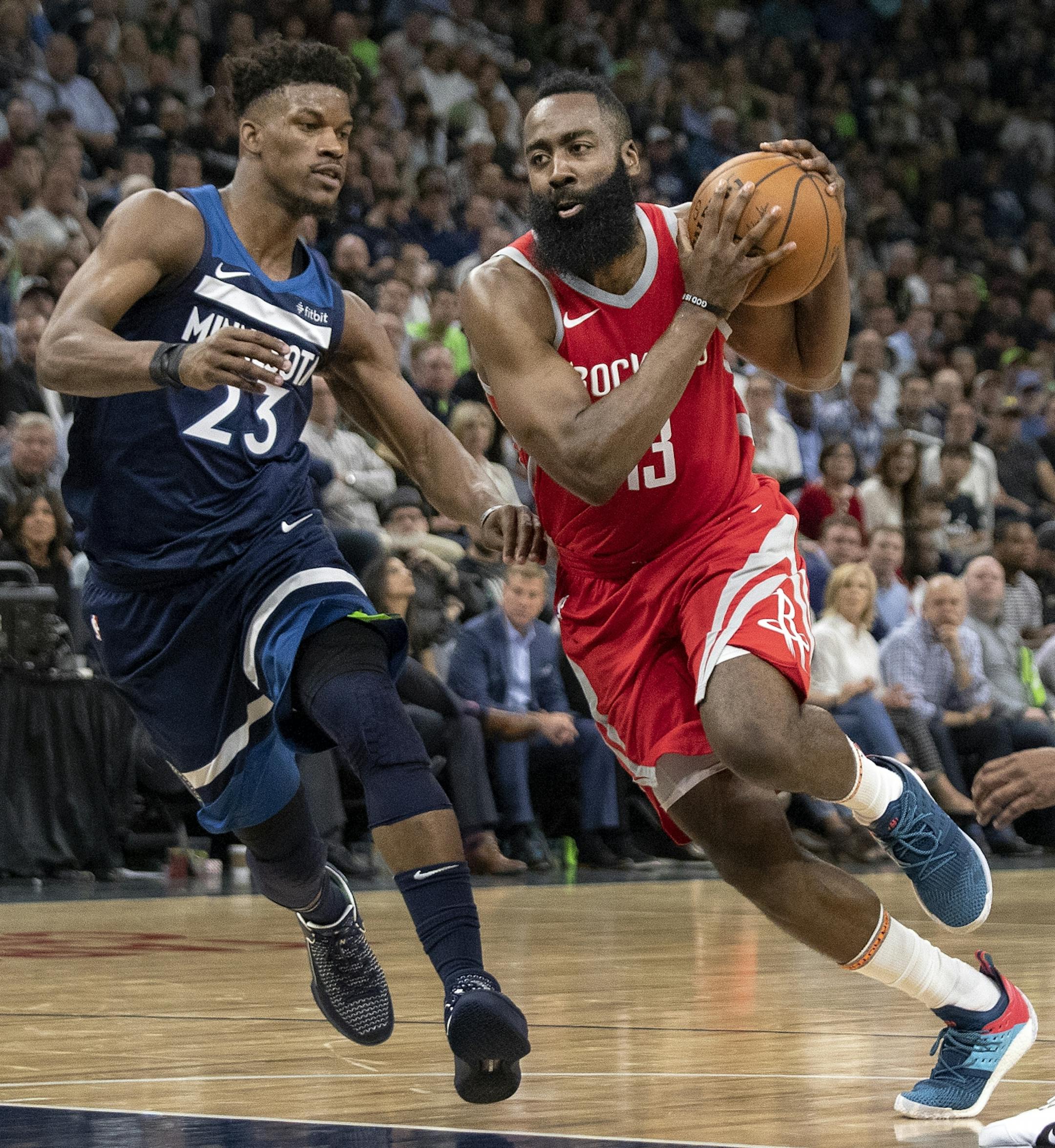 James Harden (13) was defended by Jimmy Butler (23) in the third quarter.