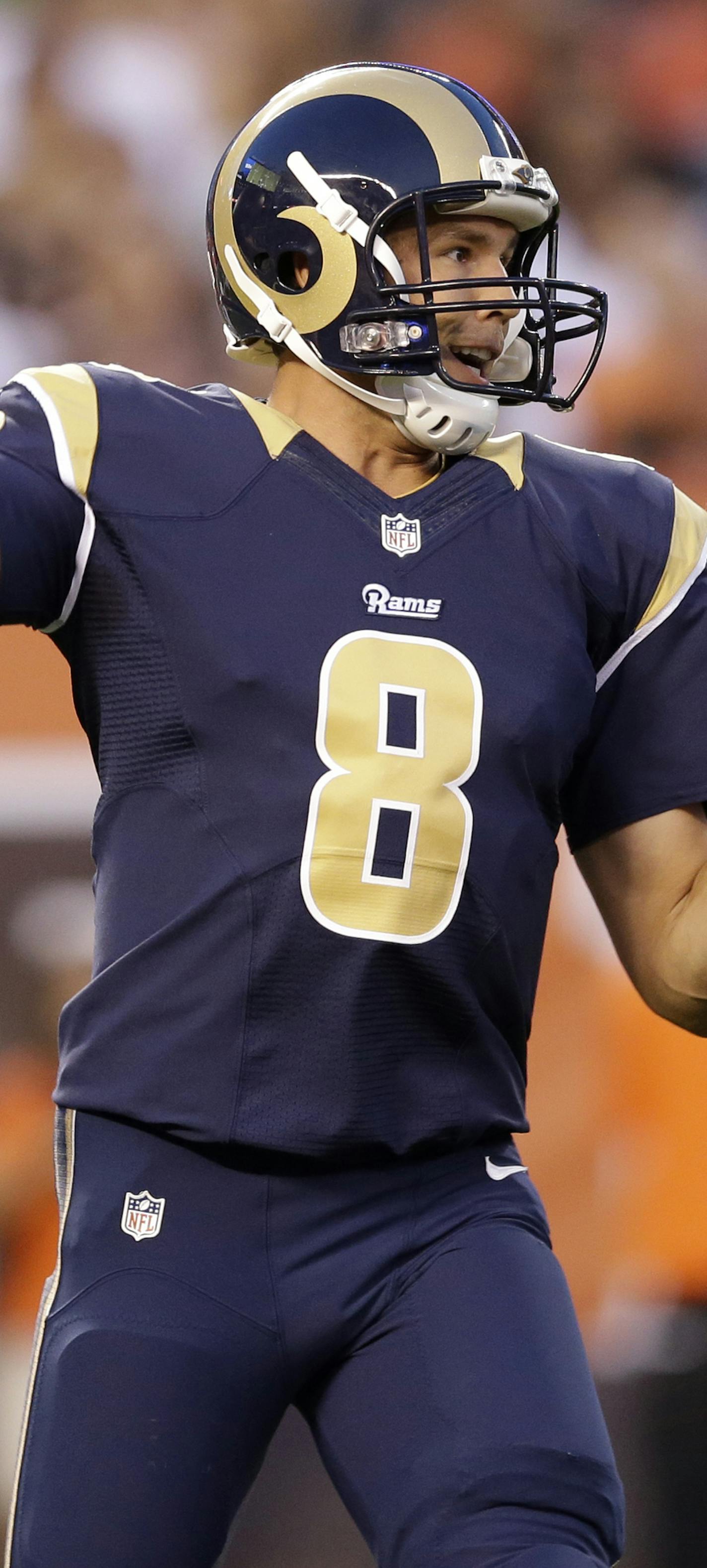 St. Louis Rams quarterback Sam Bradford passes in the first quarter of a preseason NFL football game against the Cleveland Browns Saturday, Aug. 23, 2014, in Cleveland. (AP Photo/Tony Dejak) ORG XMIT: CDS