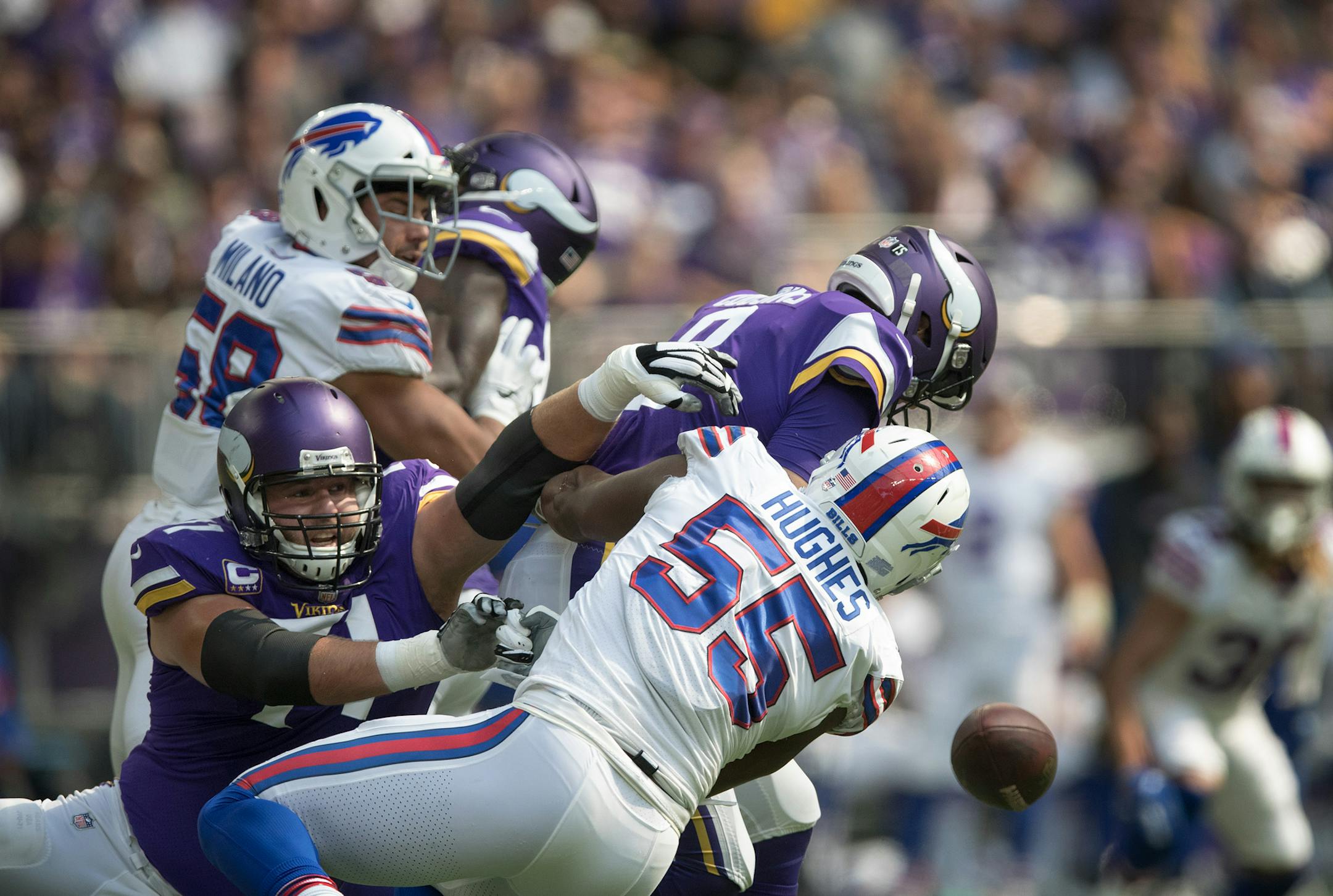 Buffalo Bills defensive end Jerry Hughes (55) sacked Minnesota Vikings quarterback Kirk Cousins (8) for a fumble recovered by the Bills in the first quarter at US Bank Stadium Sunday September 23, 2018 in Minneapolis, MN. ] JERRY HOLT ï jerry.holt@startribune.com