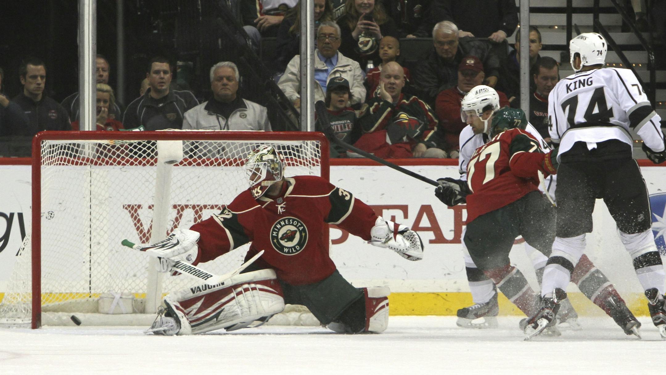 Kings Dwight King shot the puck pass Wild goalie Niklas Backstrom during the first period at the Xcel Energy Center in St. Paul Min.,Tuesday, February 28, 2012. At the end of the first period Kings up 3-0