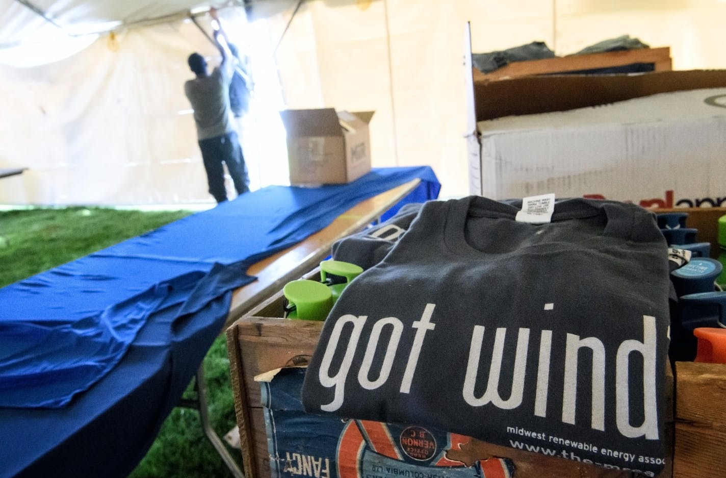 Midwest Renewable Energy Association staff setting up for the three-day Energy Fair on Harriett Island. ] GLEN STUBBE &#x2022; glen.stubbe@startribune.com Thursday September 7, 2017 -- A new report says Minnesota added 57,000 clean energy jobs -- a 5.3 percent increase -- between the end of 2015 and the end of 2016 a rate of growth nearly 4 percent larger than job growth overall in the state. There was a press conference but we're opting instead to go after the set up for the first ever Energy F