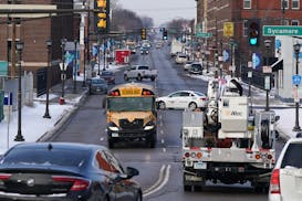 A school bus driver navigated the congestion on Rice Street on Wednesday in St. Paul.