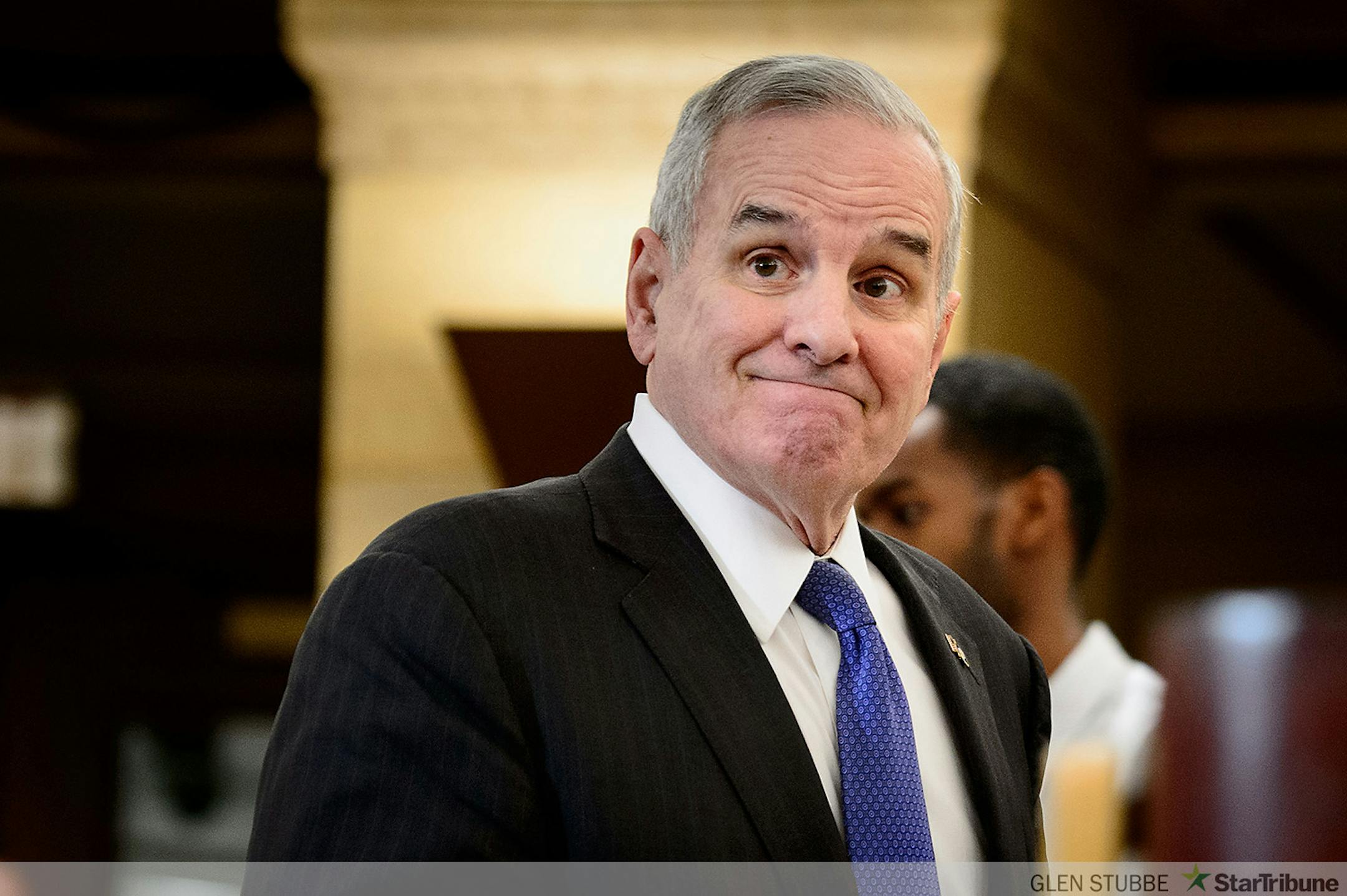Governor Dayton smiled as he entered the press conference to talk about the budget surplus.      ] GLEN STUBBE * gstubbe@startribune.com Friday, February 27, 2015  Minnesota Management and Budget Office officials, Commissioner Myron Frans, State Economist Laura Kalambokidis and State Budget Director Margaret Kelly reported that Minnesota's projected budget surplus grew to $1.9 billion, up $832 million from a previous projection.