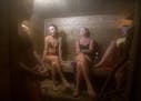 John Pederson, Abigail Rogosheske, Margie Weaver and Barbara McAfee sat in Pederson's portable sauna.