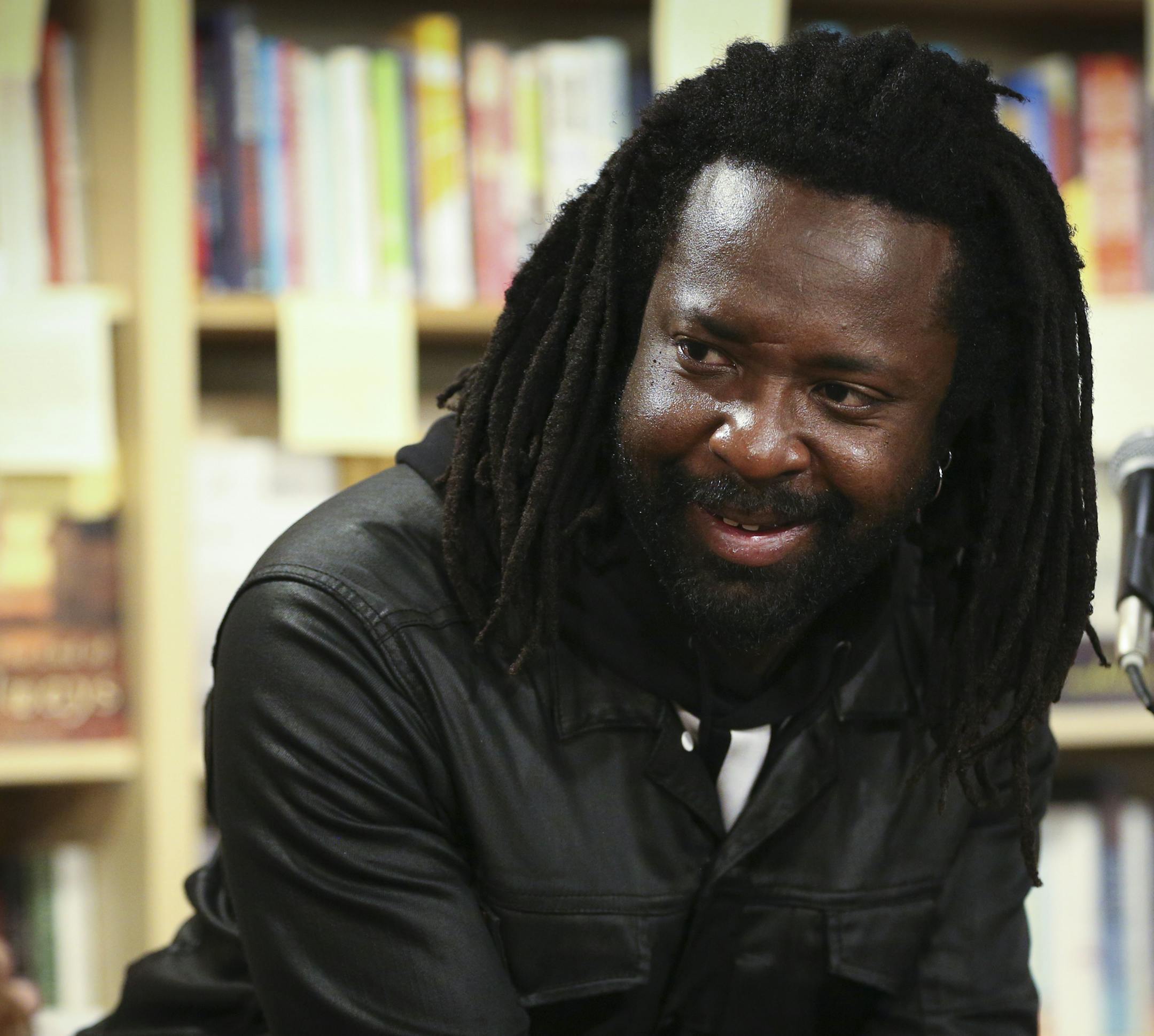 Author Marlon James talked to people after a reading of his new book "A Brief History of Seven Killings" at Common Good Books on Wednesday, October 3, 2014 in St. Paul, Minn. ] RENEE JONES SCHNEIDER • reneejones@startribune.com