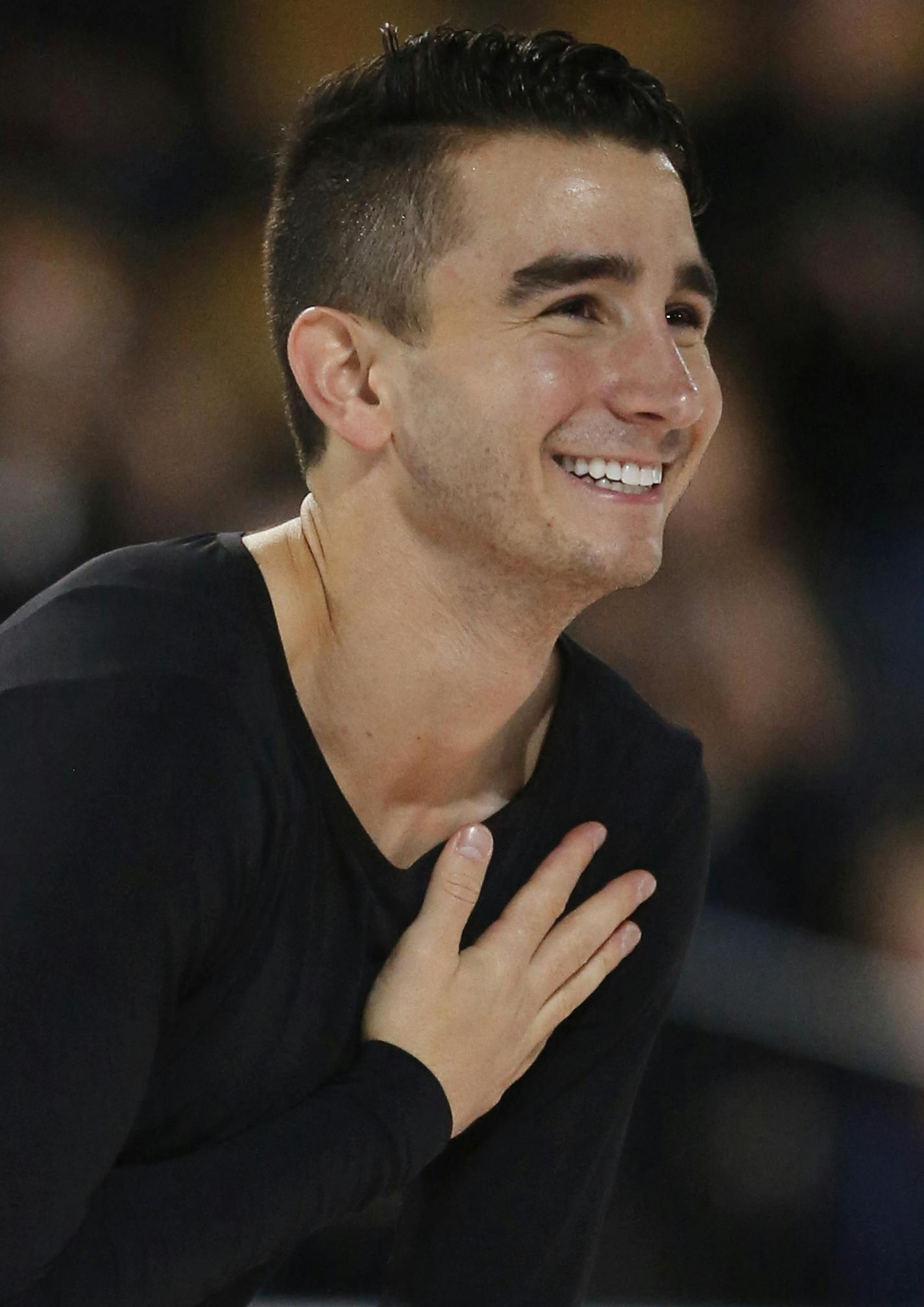 Max Aaron reacts after his performance in the men's free skate at the Skate America figure skating competition Saturday, Oct. 24, 2015, in Milwaukee. Aaron won the gold medal. (AP Photo/Jeffrey Phelps) ORG XMIT: WIJP170