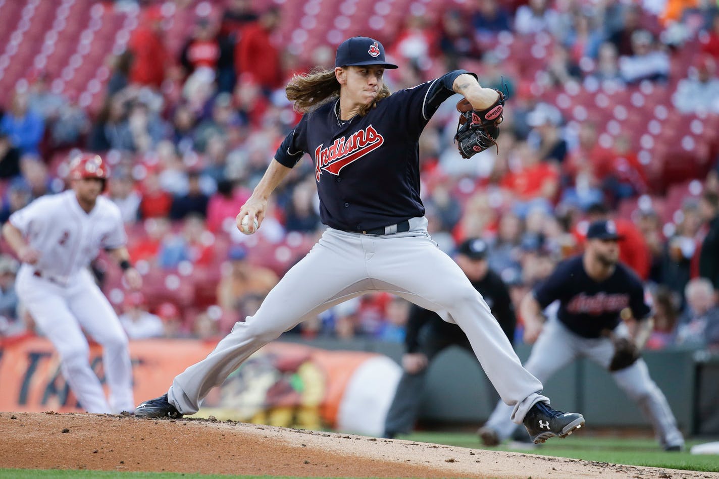 Cleveland Indians starting pitcher Mike Clevinger throws during the first inning of the team's baseball game against the Cincinnati Reds, Wednesday, May 18, 2016, in Cincinnati. (AP Photo/John Minchillo)