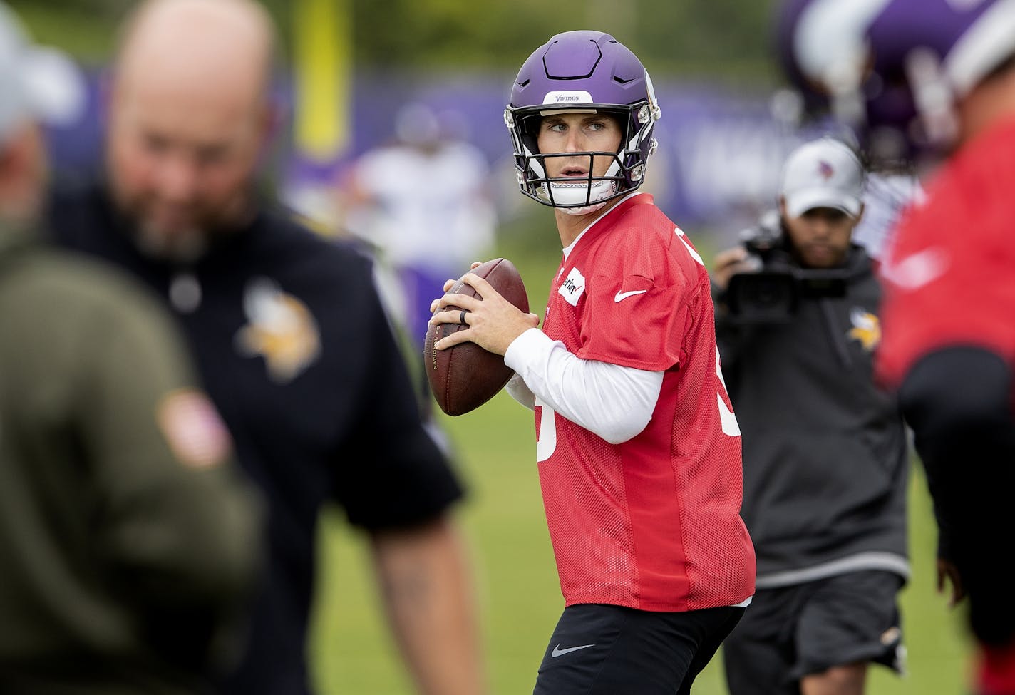 Vikings quarterback Kirk Cousins during Thursday's workout. "They're easy to lead to because they are so excited about football and they love playing this game," he said about his new teammates..