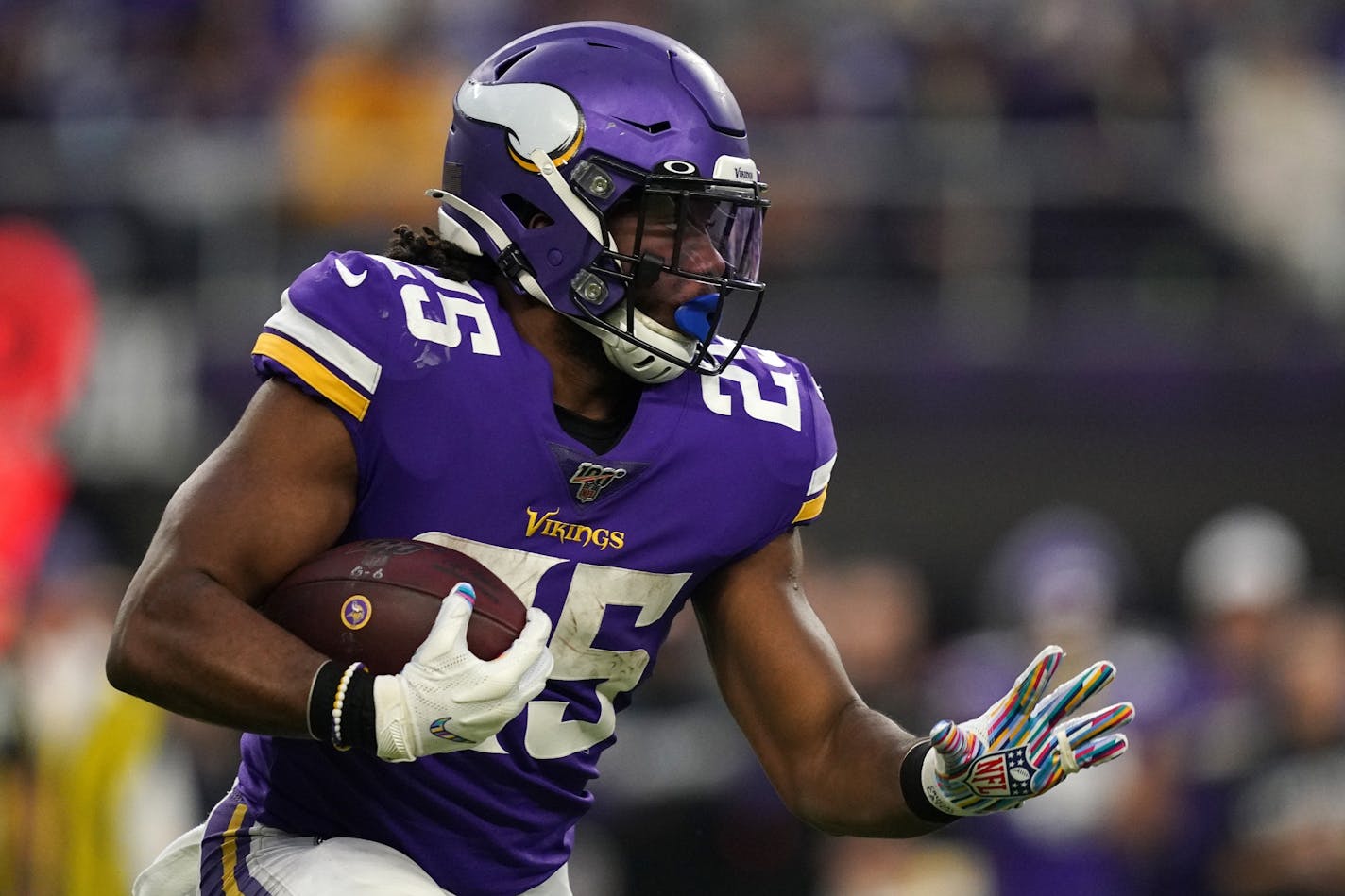 Minnesota Vikings running back Alexander Mattison (25) gained yards in the third quarter.