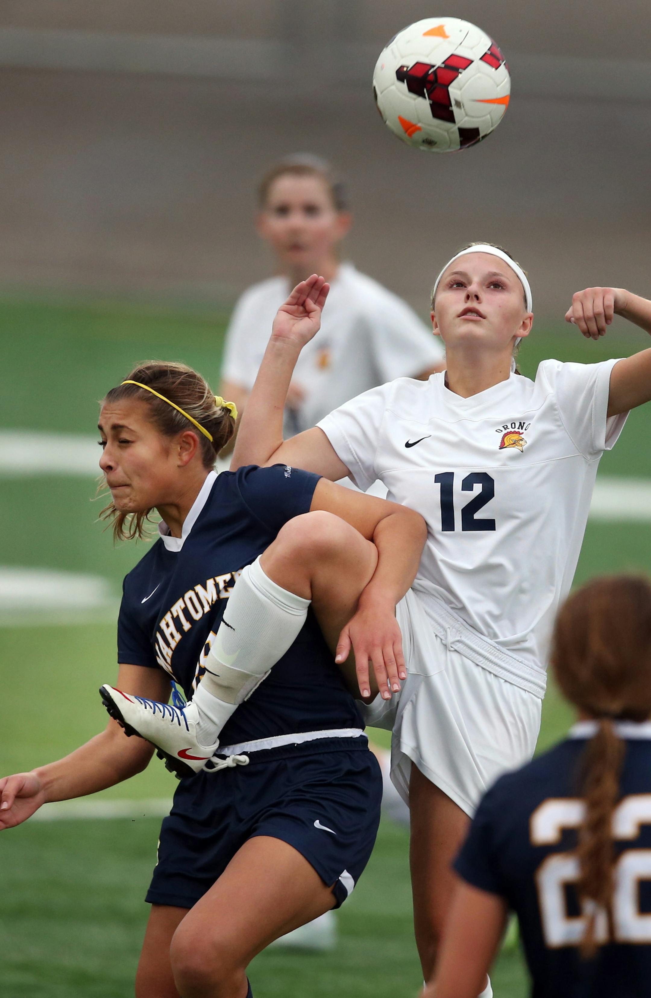 Mahtomedi Anna Broten left got tangled up with Orono Rachel Rudd in the first half of action at Husky Stadium November 4, 2015 in St. Cloud, MN. ] Orono beat Mahtomedi 2-0in class 1-A state girls state tournament soccer action at Husky Stadium. Jerry Holt/ Jerry.Holt@Startribune.com