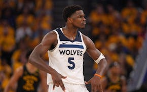 Timberwolves guard Anthony Edwards reacts after hitting a three-pointer against the Golden State Warriors in the third quarter of Game 4 Monday.