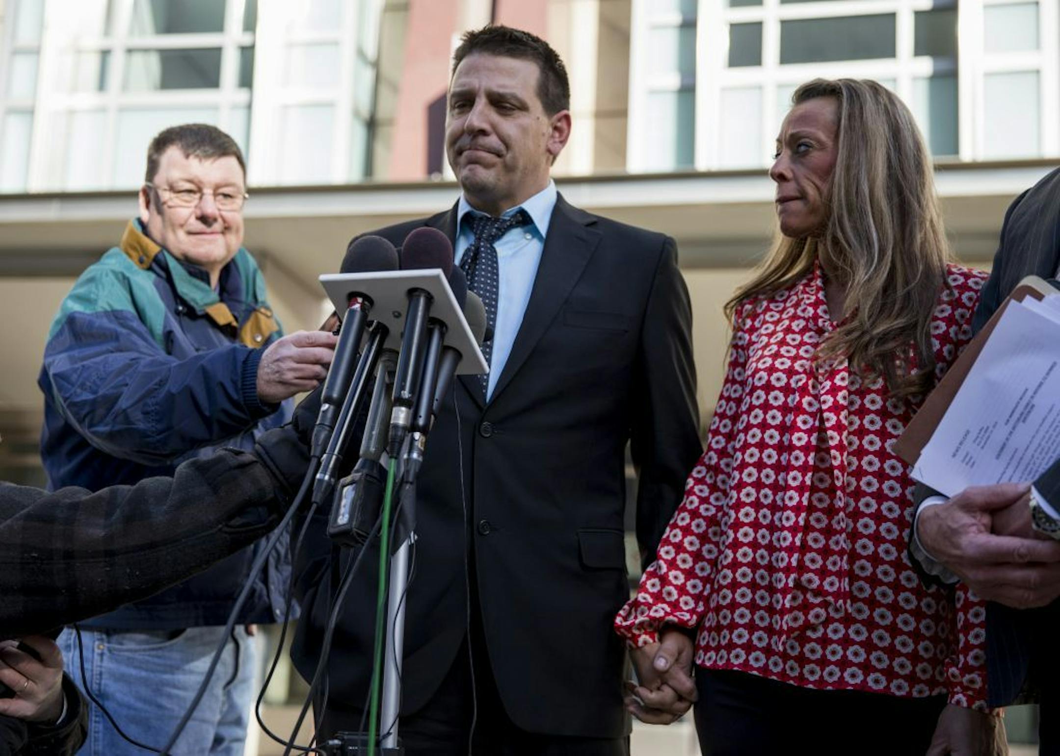 Jared Scheierl, holding the hand of his girlfriend Stacy Liestman, spoke outside the U.S. Courthouse on Monday morning shortly after addressing Danny Heinrich at the sentencing on November 21, 2016, in Minneapolis, Minn.