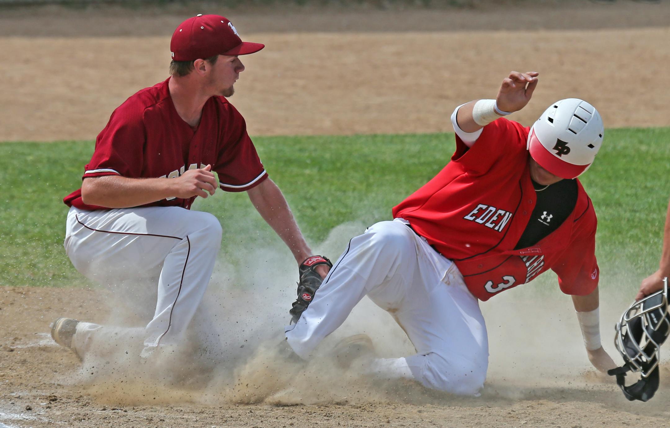 (left to right) Lakeville South's Cody Metz tagged out Eden Prairie's Jeff Athey as he tried to score in the 3rd inning.] Class 3A semifinals, Boys State Baseball Tournament, Midway Stadium, ST. Paul, MN., 6/13/14. Bruce Bisping/Star Tribune bbisping@startribune.com Cody Metz, Jeff Athey/roster.