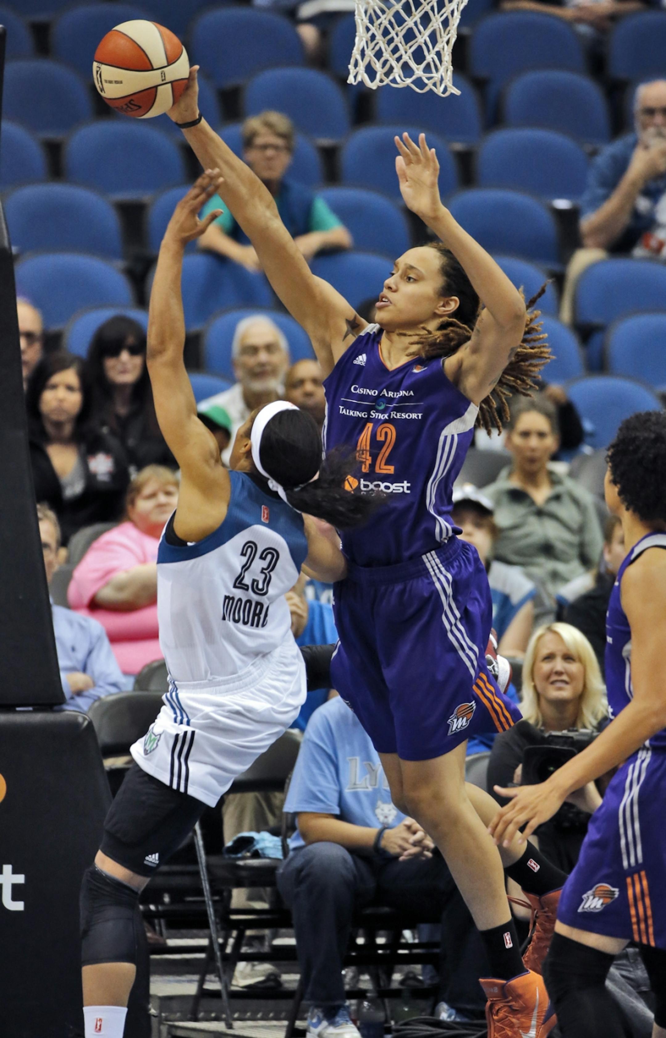 Phoenix center Brittney Griner blocked thw shot of Lynx Maya Moore.