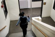 Minneapolis Police officer and school resource officer Drea Leal does her rounds in the hallways Friday, Jan. 18, 2019 at Minneapolis Roosevelt High, 