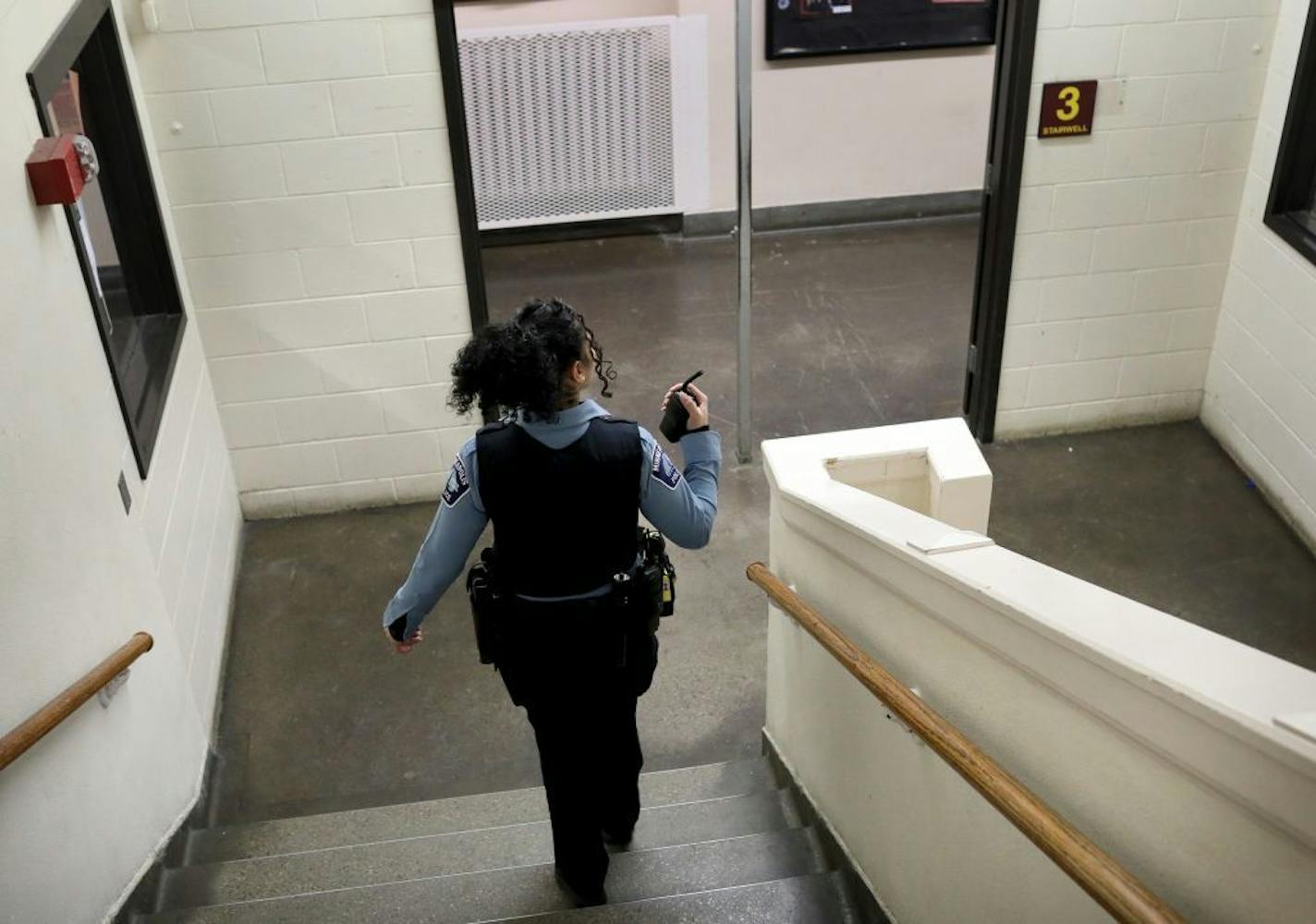 Minneapolis Police officer and school resource officer Drea Leal does her rounds in the hallways Friday, Jan. 18, 2019 at Minneapolis Roosevelt High, in Minneapolis, MN