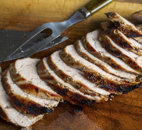 Pork tenderloin, soaked in a marinade that includes cilantro, ginger, garlic, fish and soy sauces, chile pepper and brown sugar, then grilled or broil