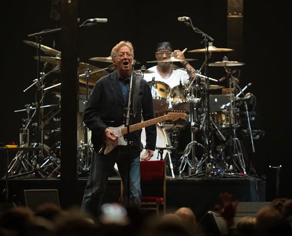 Eric Clapton and his band early in their set Thursday night. Eric Clapton's small U.S. tour made a stop at Xcel Energy Center in St. Paul Thursday nig
