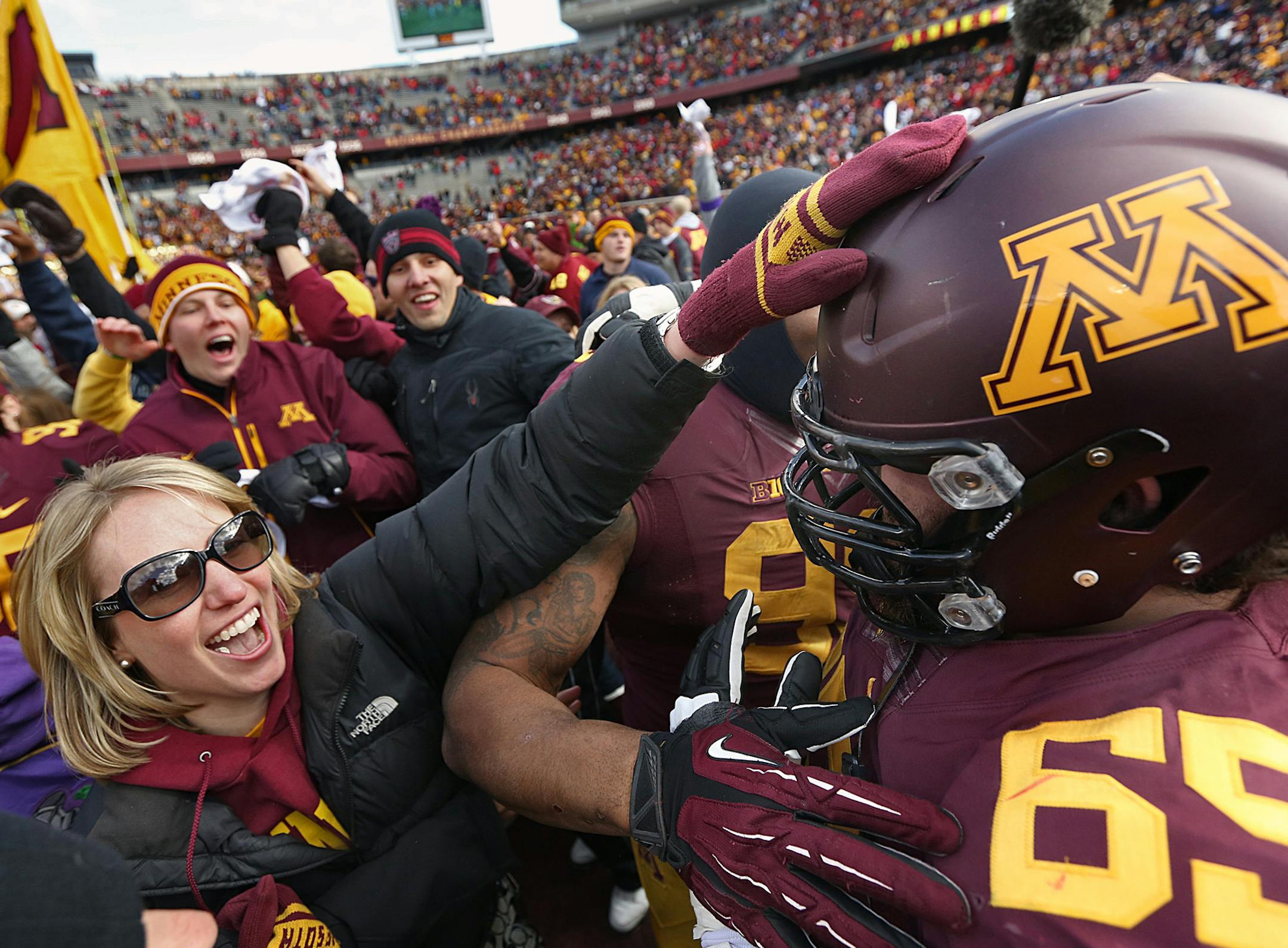 Josh Campion and other Gopher players were greeted by enthusiastic fans after the game. ]JIM GEHRZ ‚Ä¢ jgehrz@startribune.com Minneapolis, MN / Oct 27, 2013, 11:00 AM BACKGROUND INFORMATION- The Minnesota Golden Gopher football team played the Nebraska Cornhuskers at TCF Bank Stadium. Minnesota won, 34-23.