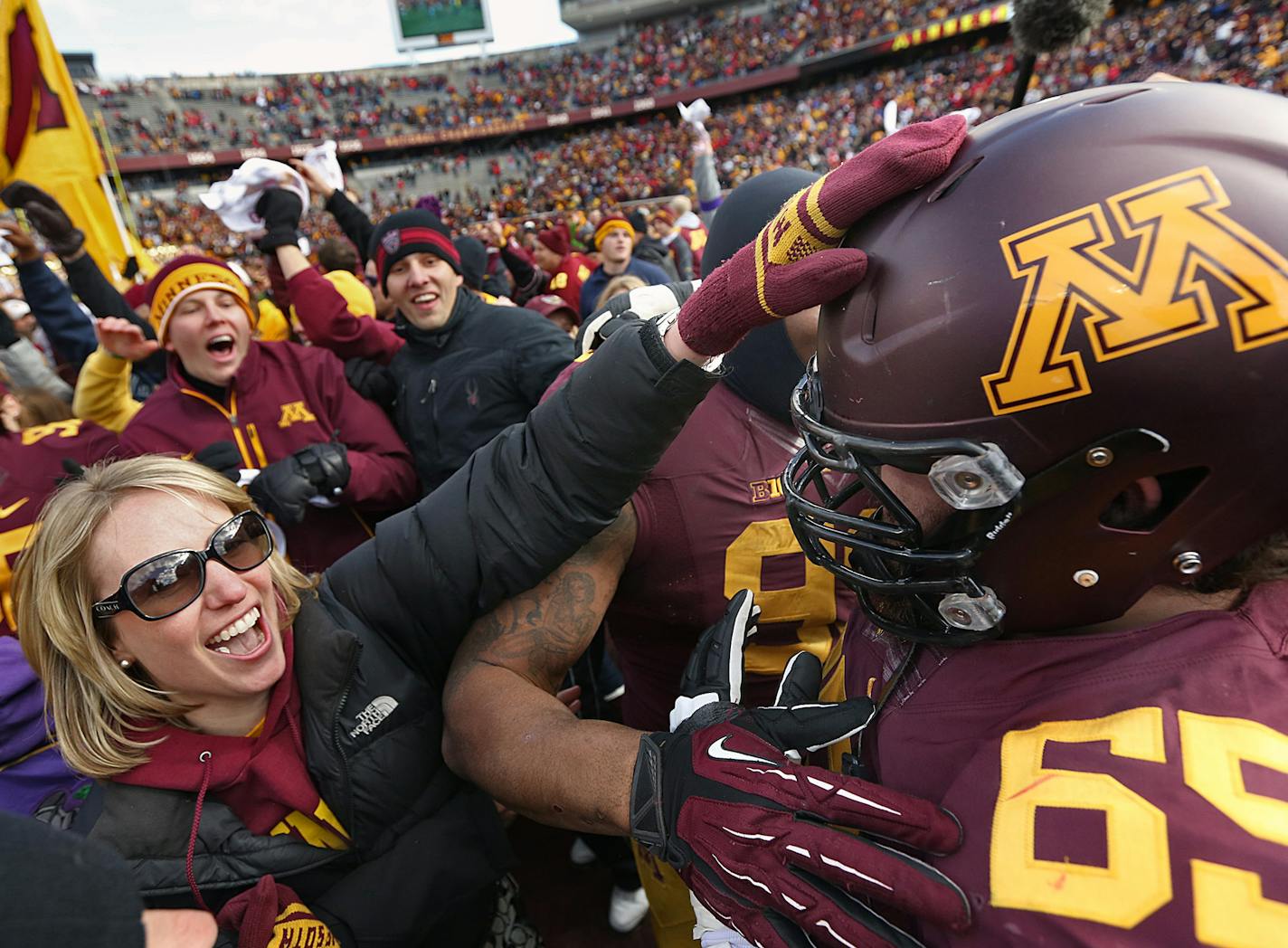 Josh Campion and other Gopher players were greeted by enthusiastic fans after the game. ]JIM GEHRZ &#x201a;&#xc4;&#xa2; jgehrz@startribune.com Minneapolis, MN / Oct 27, 2013, 11:00 AM BACKGROUND INFORMATION- The Minnesota Golden Gopher football team played the Nebraska Cornhuskers at TCF Bank Stadium. Minnesota won, 34-23.