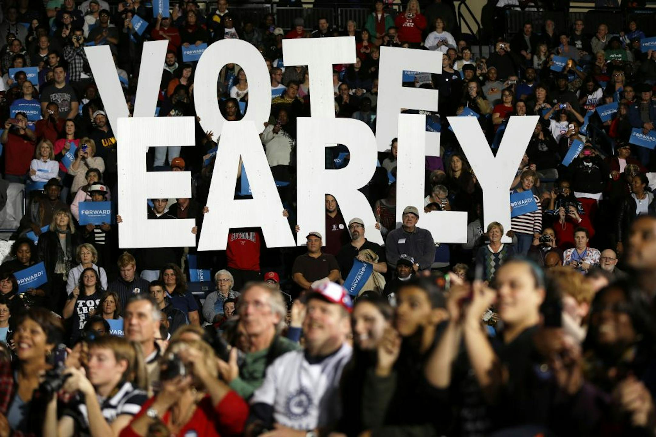 A"Vote Early" sign in displayed as former President Bill Clinton speaks at a President Barack Obama campaign rally, Monday, Oct. 29, 2012, in Youngstown, Ohio.