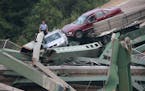 A portion of the I-35W bridge over the Mississippi River collapsed during the evening rush hour in Minneapolis, Minnesota, Wednesday, August 1, 2007.