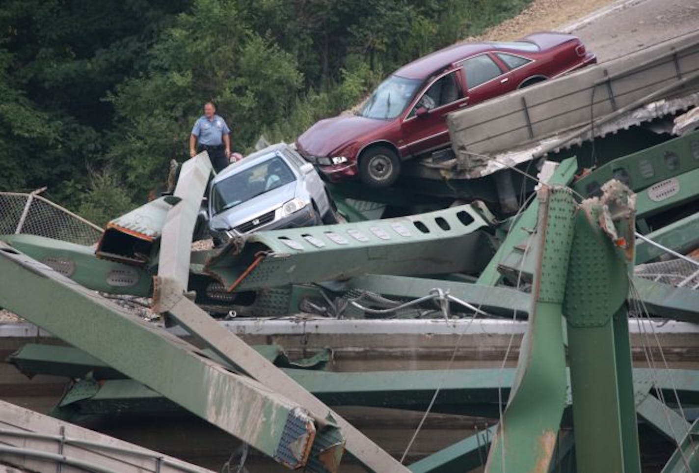 A portion of the I-35W bridge over the Mississippi River collapsed during the evening rush hour in Minneapolis, Minnesota, Wednesday, August 1, 2007.