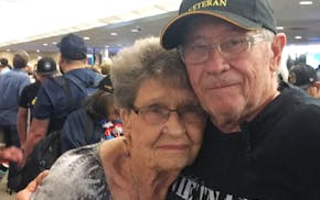 John Walker, 68, and his mother Carolyn, 90, of Visalia, hug each other after John Walker arrived Wednesday, May 15, 2019, from a three-day trip to Wa