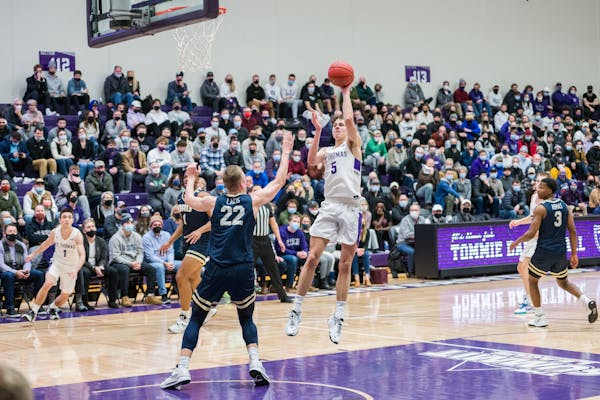 Parker Bjorklund, who played high school basketball in Chaska, took a shot against Oral Roberts in January.