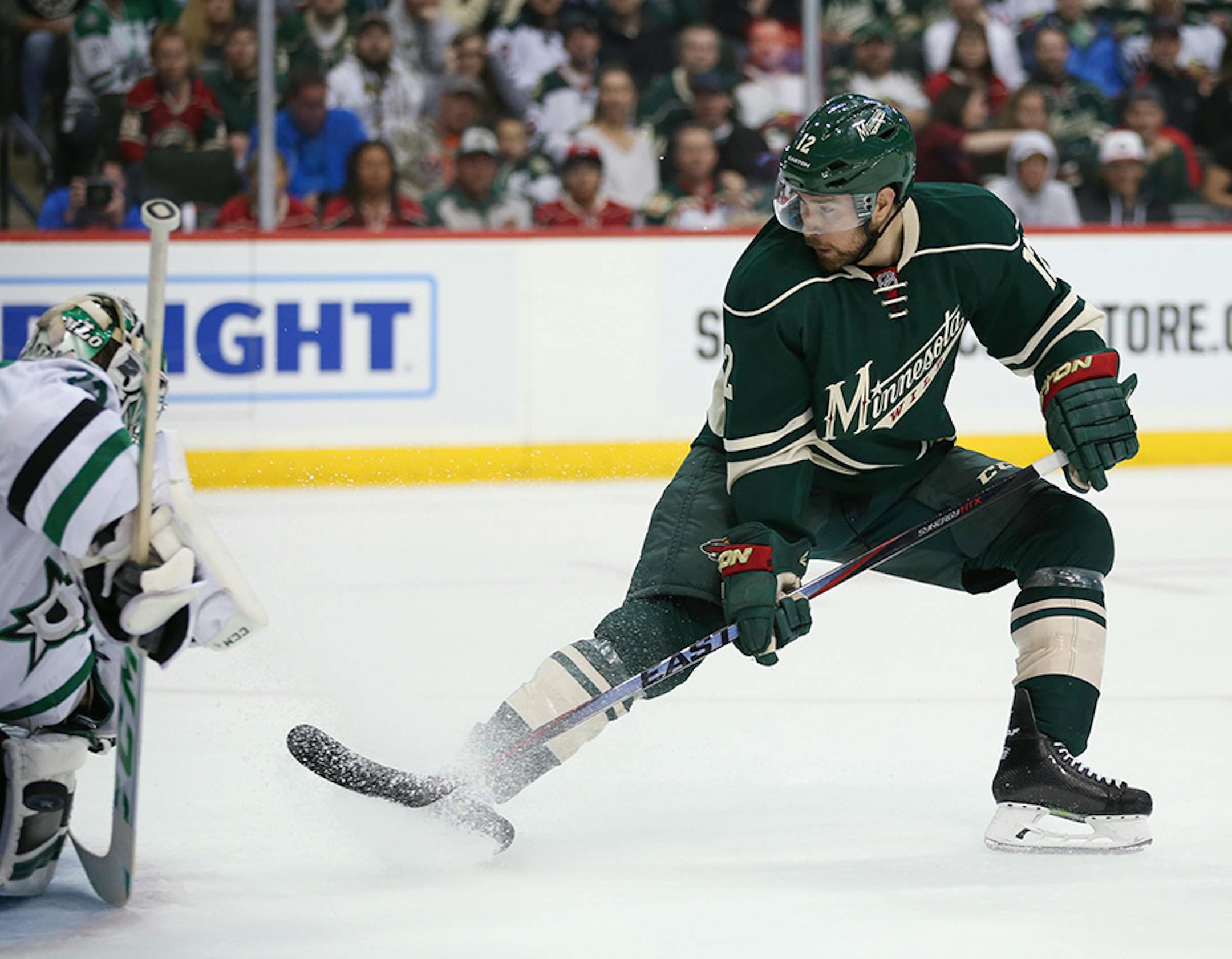 Wild right wing David Jones (12) tried to deflect a shot in the second period Monday night.