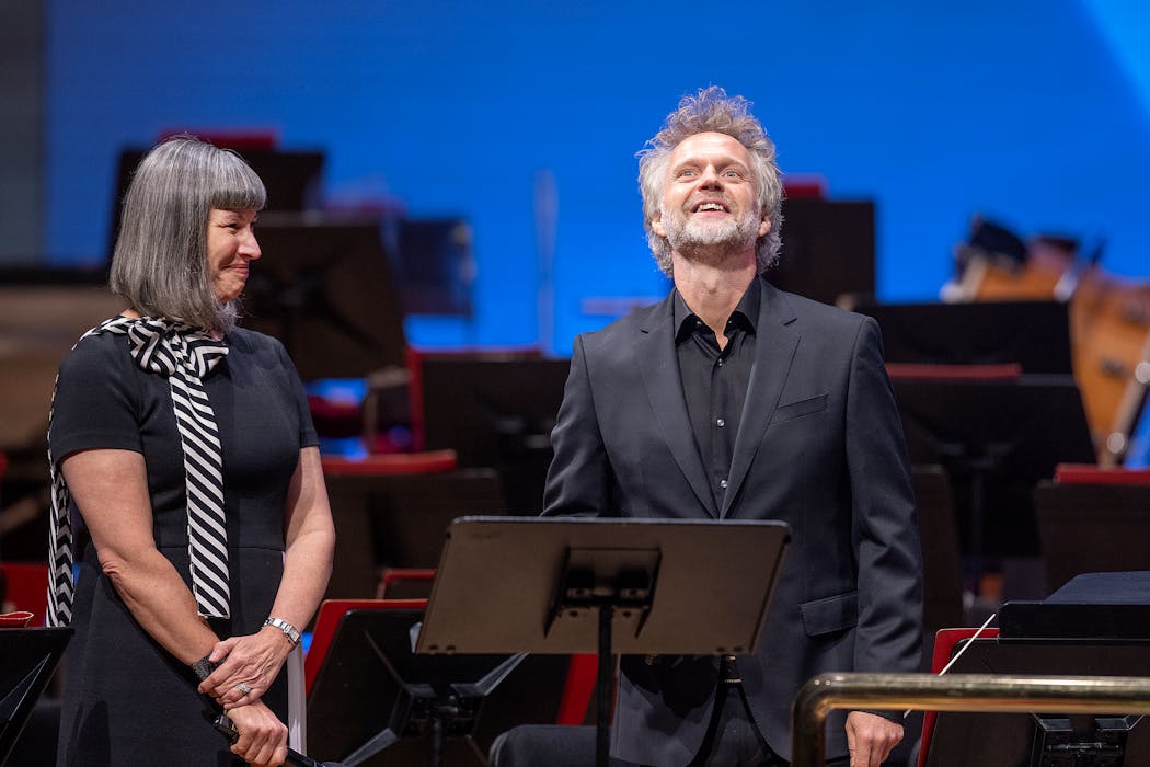 Michelle Miller Burns, the Minnesota Orchestra's president and CEO, smiles after introducing Thomas Søndergård in his first concert as music director in 2023.