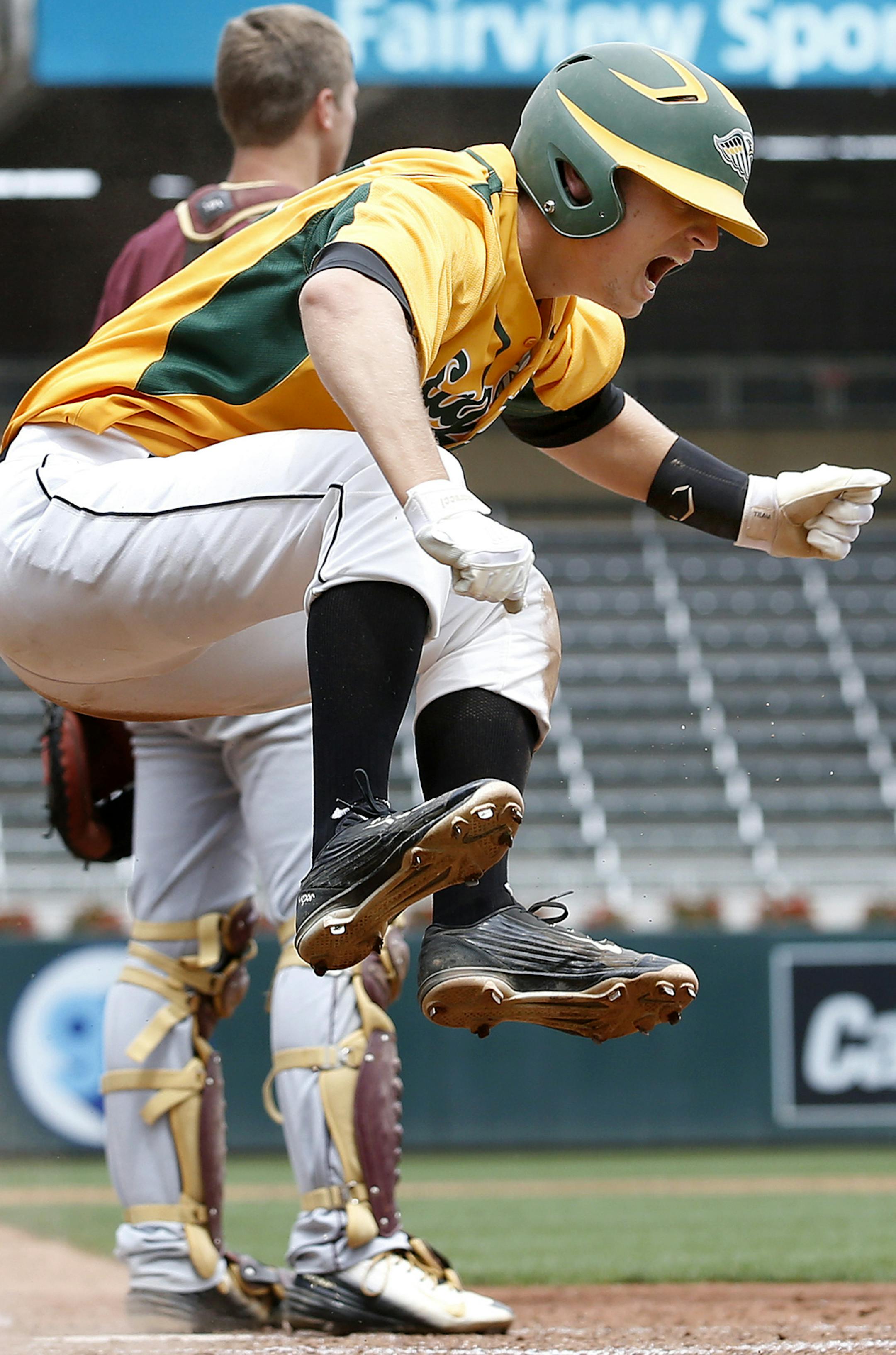 Simon Killeen (28) of New Life Academy celebrated after scoring the winning run in the bottom of the eight inning. ] CARLOS GONZALEZ cgonzalez@startribune.com - June 15, 2015, Minneapolis, MN, Target Field, High School Prep Baseball Championships, Class 1A baseball championship, - Springfield vs. New Life Academy