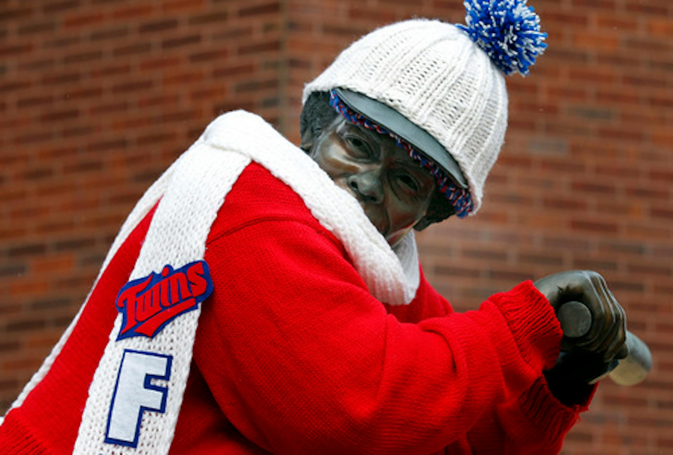 A statue of hall of famer and former Minnesota Twins player Rod Carew was dresses with a hat, scarf and sweater outside of Target Field in Minneapolis, Minn.  ] CARLOS GONZALEZ     cgonzalez@startribune.com - January 20, 2013, Minneapolis, Minn., Target Field, Minnesota Twins, ORG XMIT: MIN1301201648300371