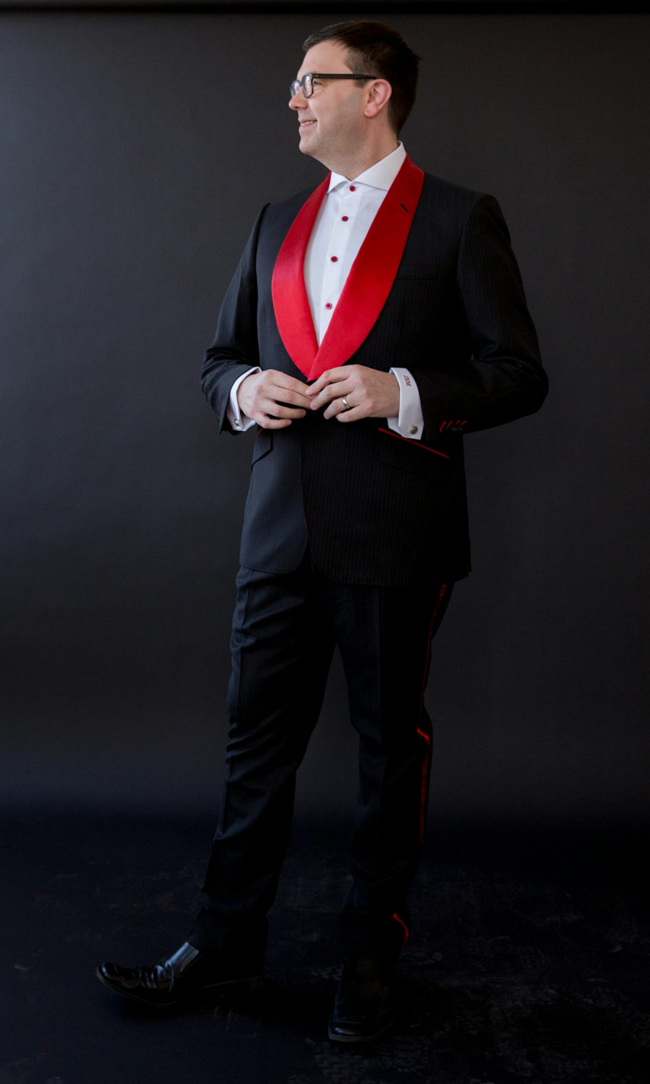 The King Brothers customized KMSP-TV personality Jason Matheson’s suit with red satin lapels for the annual Red Dress Collection charity runway show.