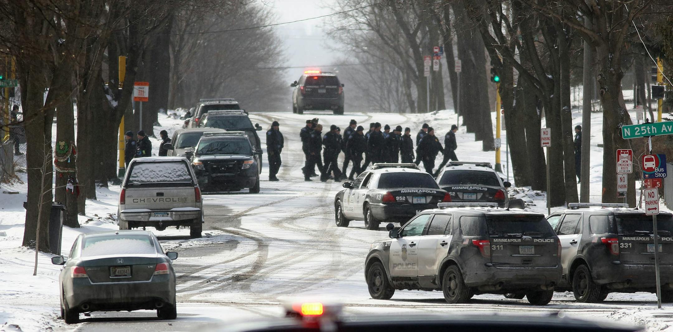 Police officers gathered along N. Fremont Ave.