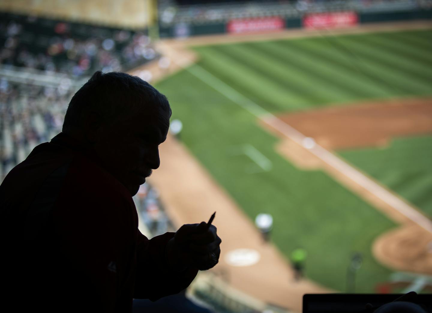 Stew Thornley, an official scorer for Twins games at Target Field, prepared to keep track of the first game of a doubleheader.