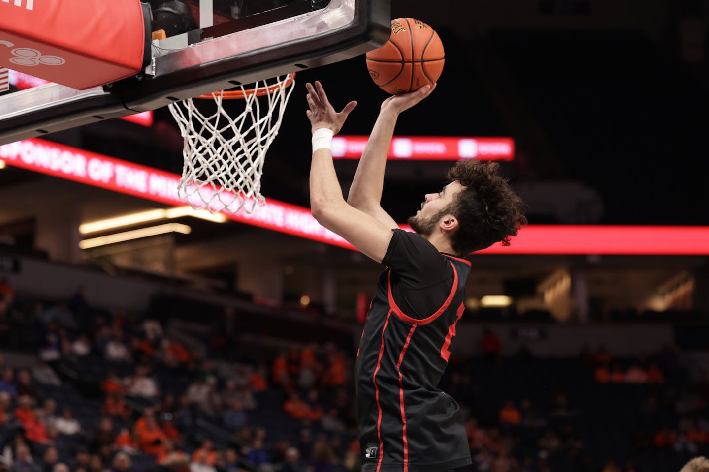 Lakeville North's Hudson Vaith (22) finds plenty of open space under the basket and lays the ball up for two points. Vaith finished with 13 points for the Panthers. Photo by Cheryl A. Myers, SportsEngine