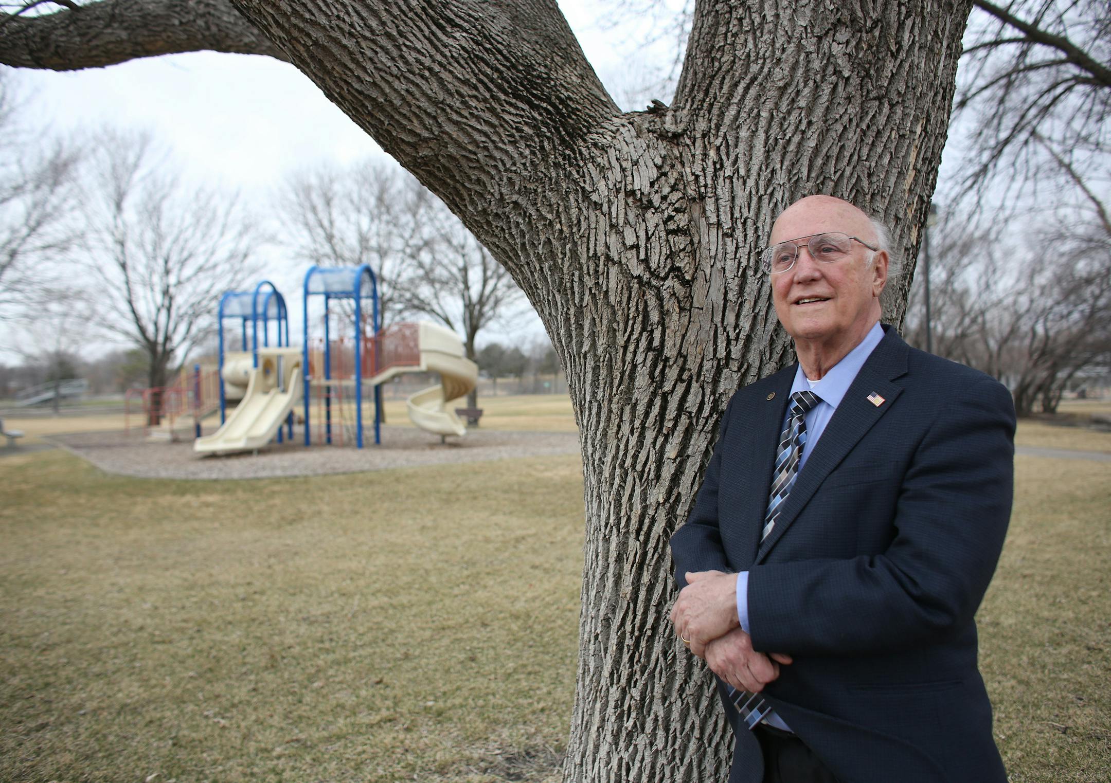 Dr. Duane Orn stood by one of the trees in Centennial Park where a new ampitherater will be built. ] (KYNDELL HARKNESS/STAR TRIBUNE) kyndell.harkness@startribune.com A new ampitheater to be built in Centennial Park in Brooklyn Center Min., Wednesday, April 1, 2014.