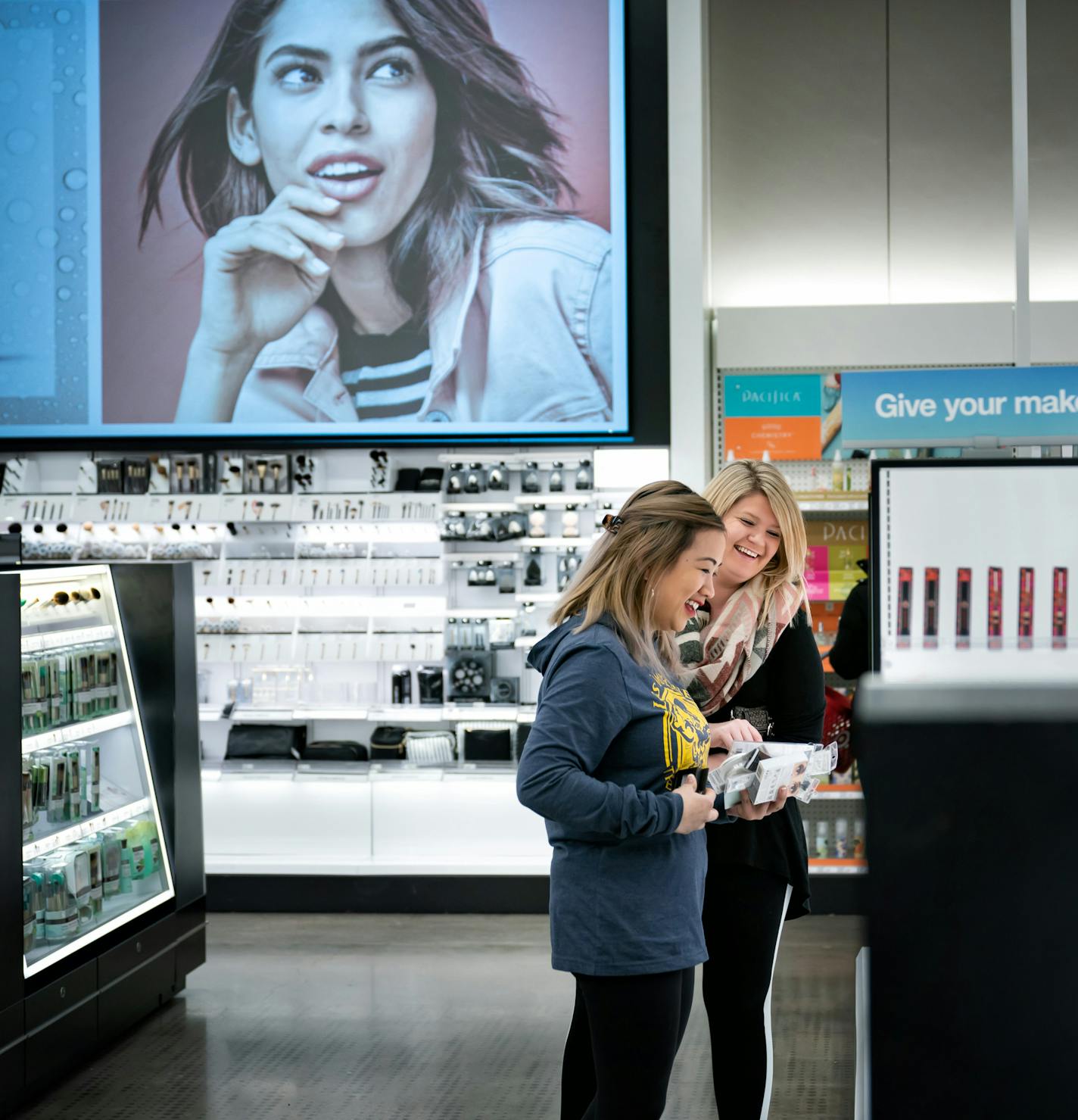 Maria Almoite, left, and Christina Pace, right, shopped the newly remodeled Beauty section in the Target store in downtown Minneapolis. ] GLEN STUBBE &#x2022; glen.stubbe@startribune.com Wednesday, February 27, 2019 Target store in downtown Minneapolis. Three years ago, Target made a $7 billion bet to revamp its stores and shopping experience, transforming stores into mini distribution centers. We try to do an assessment as it rounds the bend.