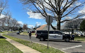 Police patrol a neighborhood after a shooting on Saturday, March 16, 2024 in Levittown, Pa.