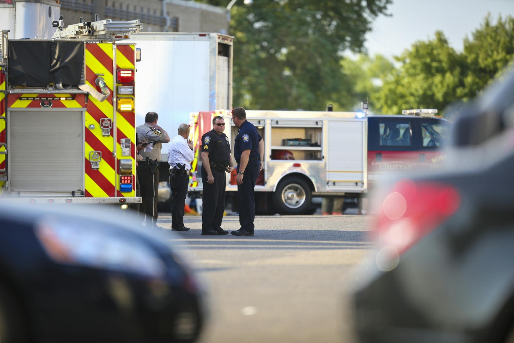 Police at the scene of a shooting in Roseville, Minn., on Wednesday, September 5, 2013.