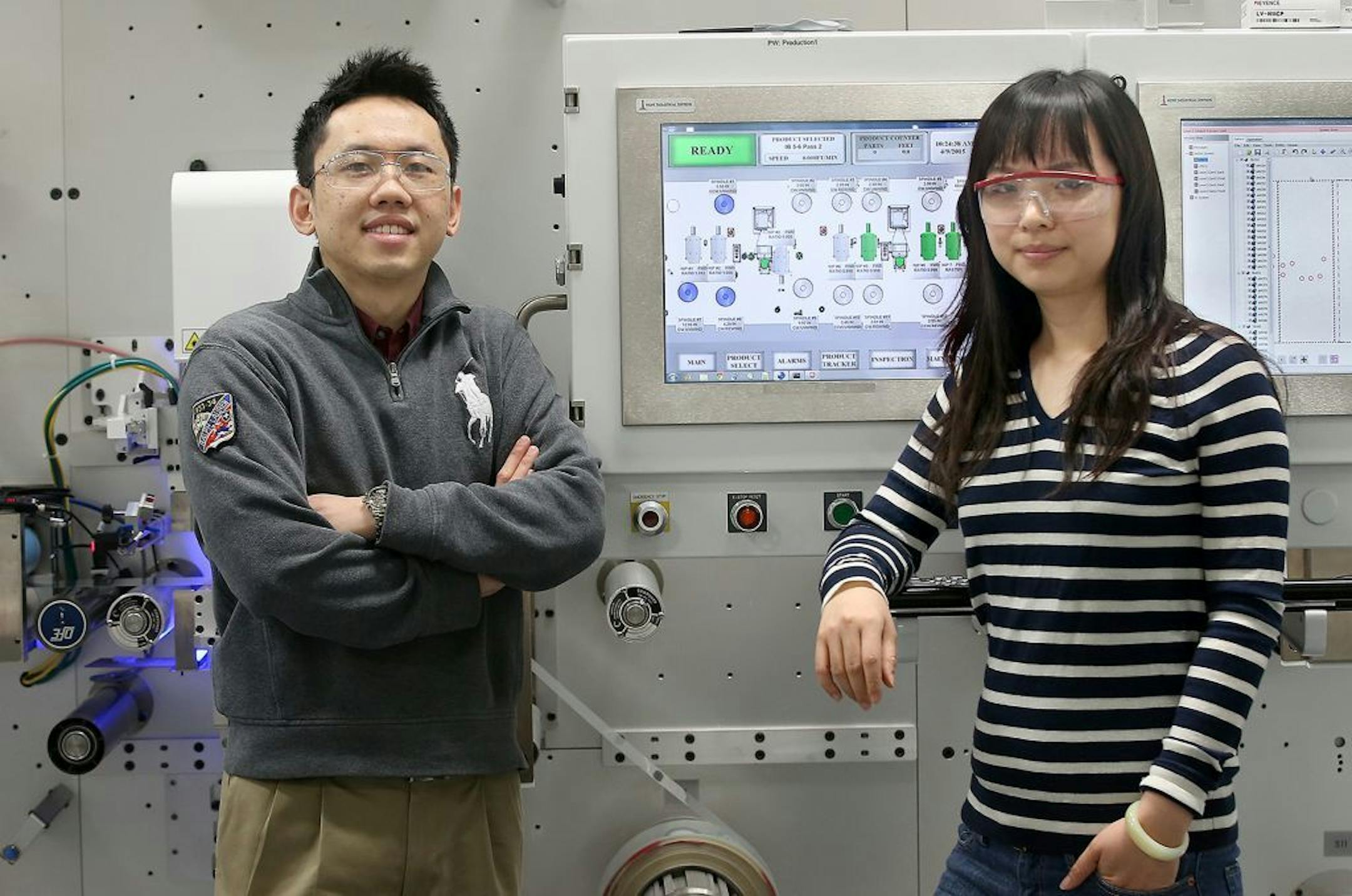 Au ChunXing, left, from Malaysia and Yahui Zhang from China, work as engineers at LasX Industries. Experts are predicting another short application season for H-1Bs, the popular work visas for college-educated professionals.